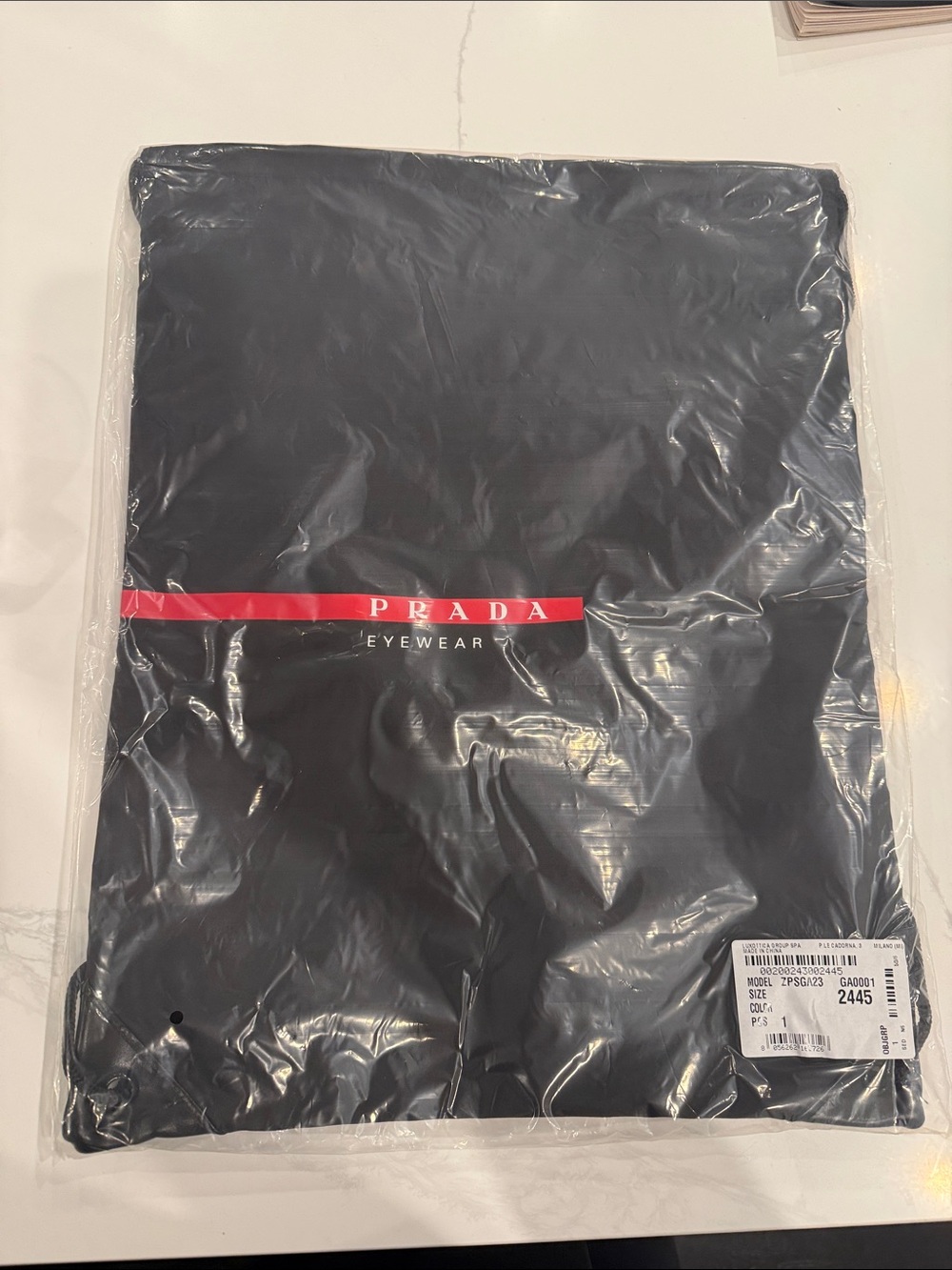 Prada Black Eyewear drawstring bag with Red Logo Stripe